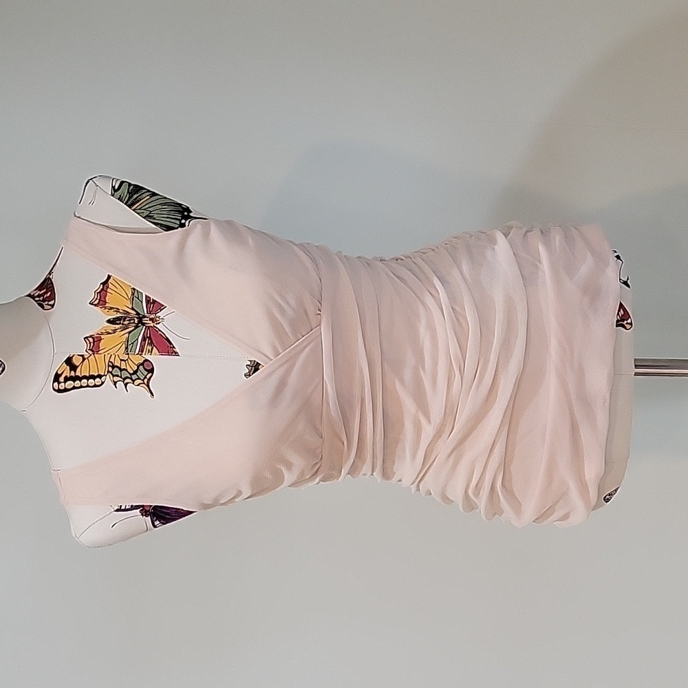 Express beige tank top gathered at sides. Size is Medium. Fabric has shimmer.